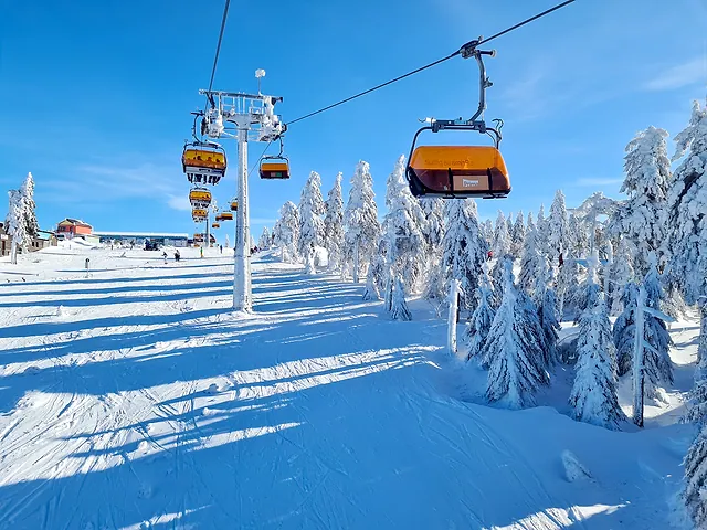 Chairlift in powder snow